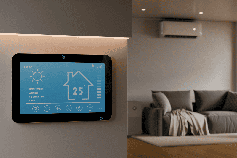 Smart home digital thermostat interface on the wall in a modern living room