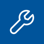 White wrench icon on a blue background.